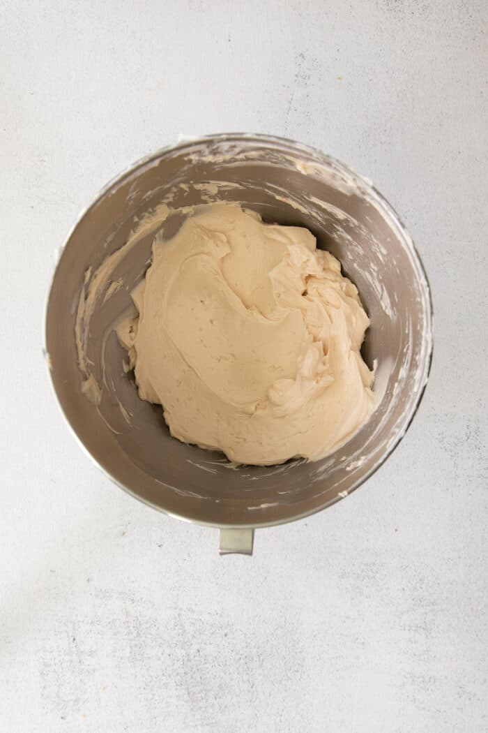 Buttercream frosting in a mixing bowl