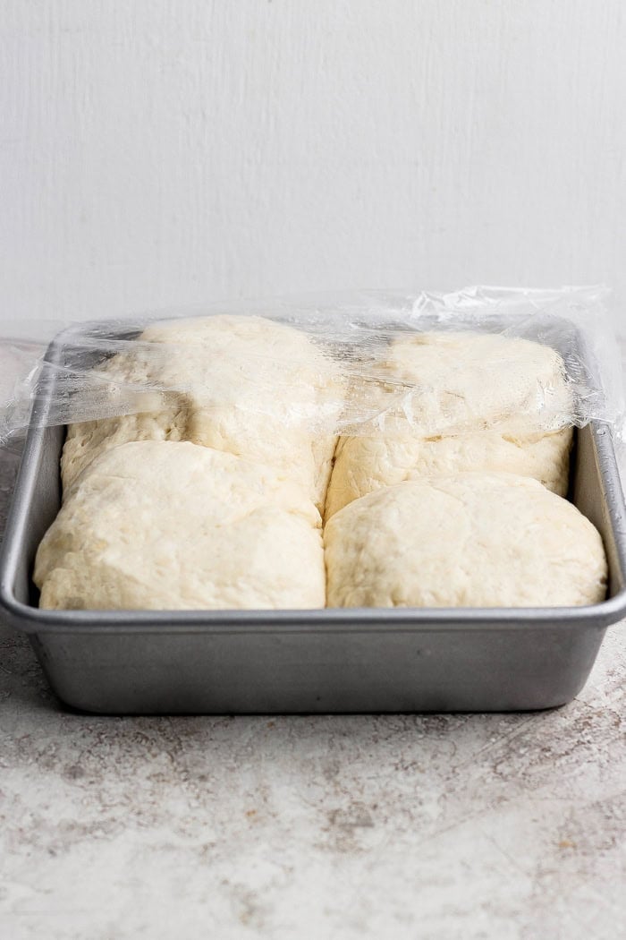 Pizza dough in pan after rising.