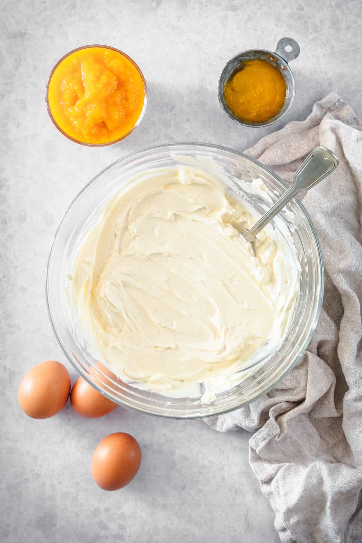 This is the best pumpkin cheesecake recipe! It's creamy, easy to make, and packed with pumpkin flavor, baked in a crunchy gingersnap crust. Whipped cream cheese