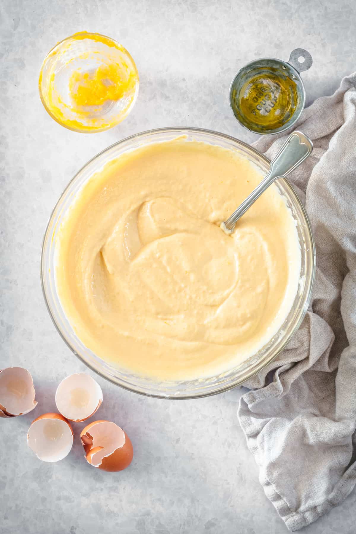 This is the best pumpkin cheesecake recipe! It's creamy, easy to make, and packed with pumpkin flavor, baked in a crunchy gingersnap crust. Pumpkin cheesecake filling in a mixing bowl