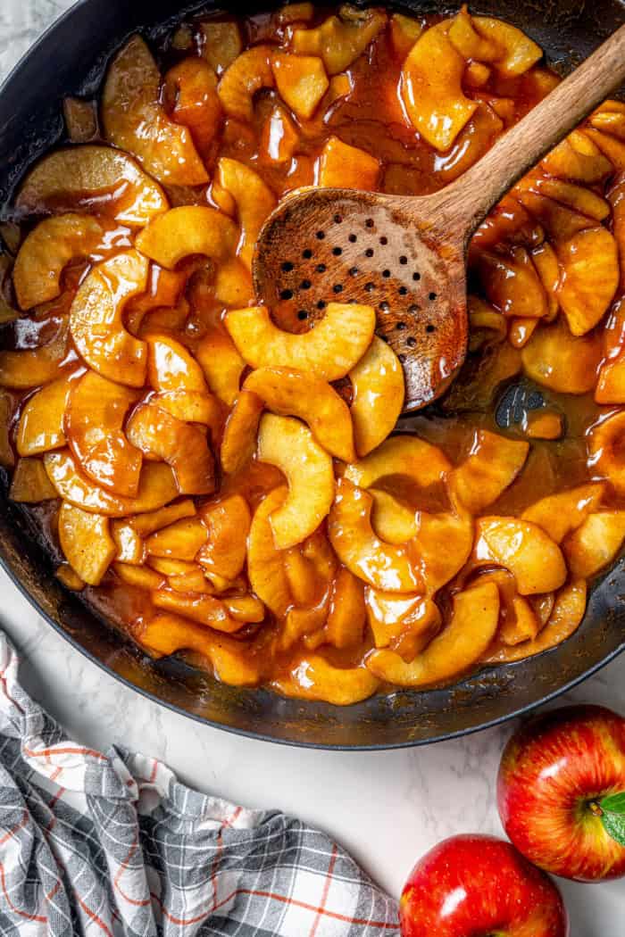 Overhead view of sautéed apples in pan