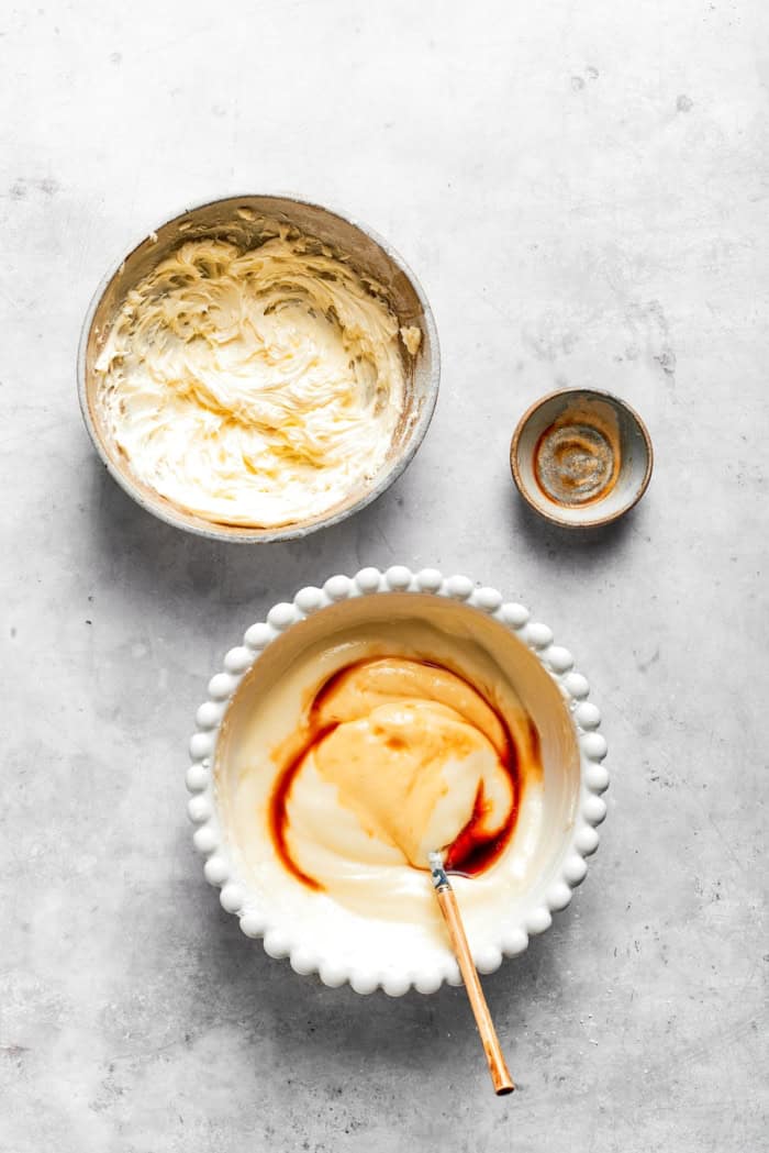 Overhead view showing frosting being made for red velvet cake