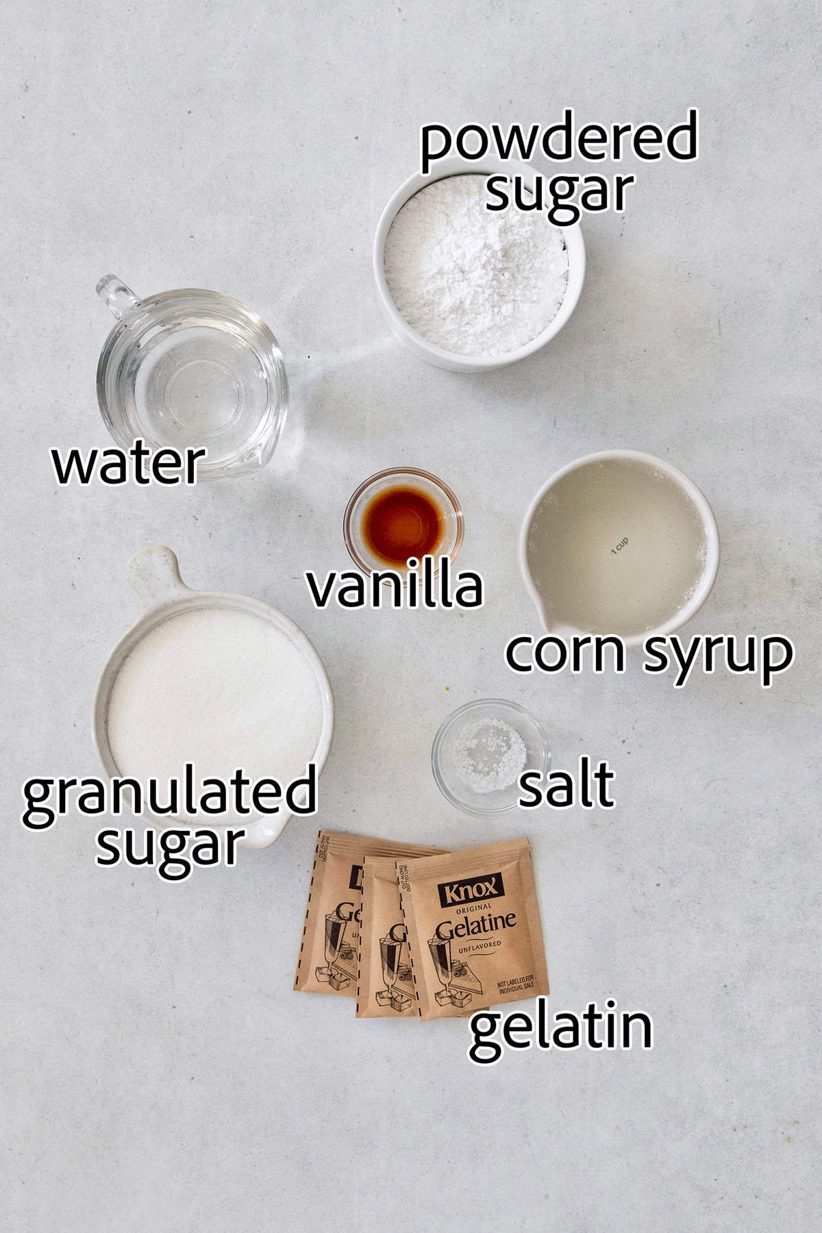 Homemade marshmallows are easier than you think! This recipe yields perfect fluffy marshmallows that are SO much better than store-bought. Overhead view of ingredients for homemade marshmallows