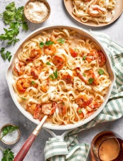 Skillet with creamy shrimp pasta.