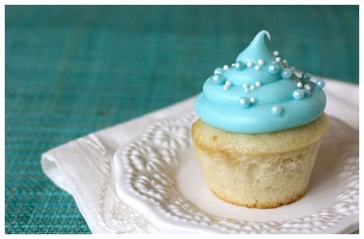 a mini cupcake on a white plate