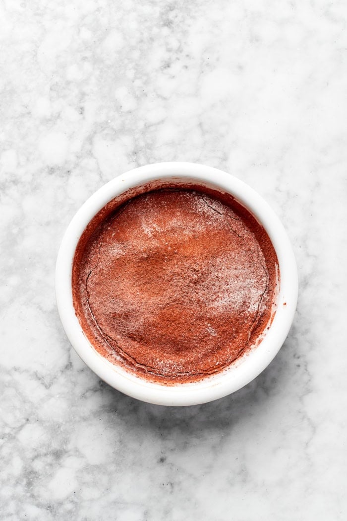 Overhead view of dry ingredients added to brownie batter