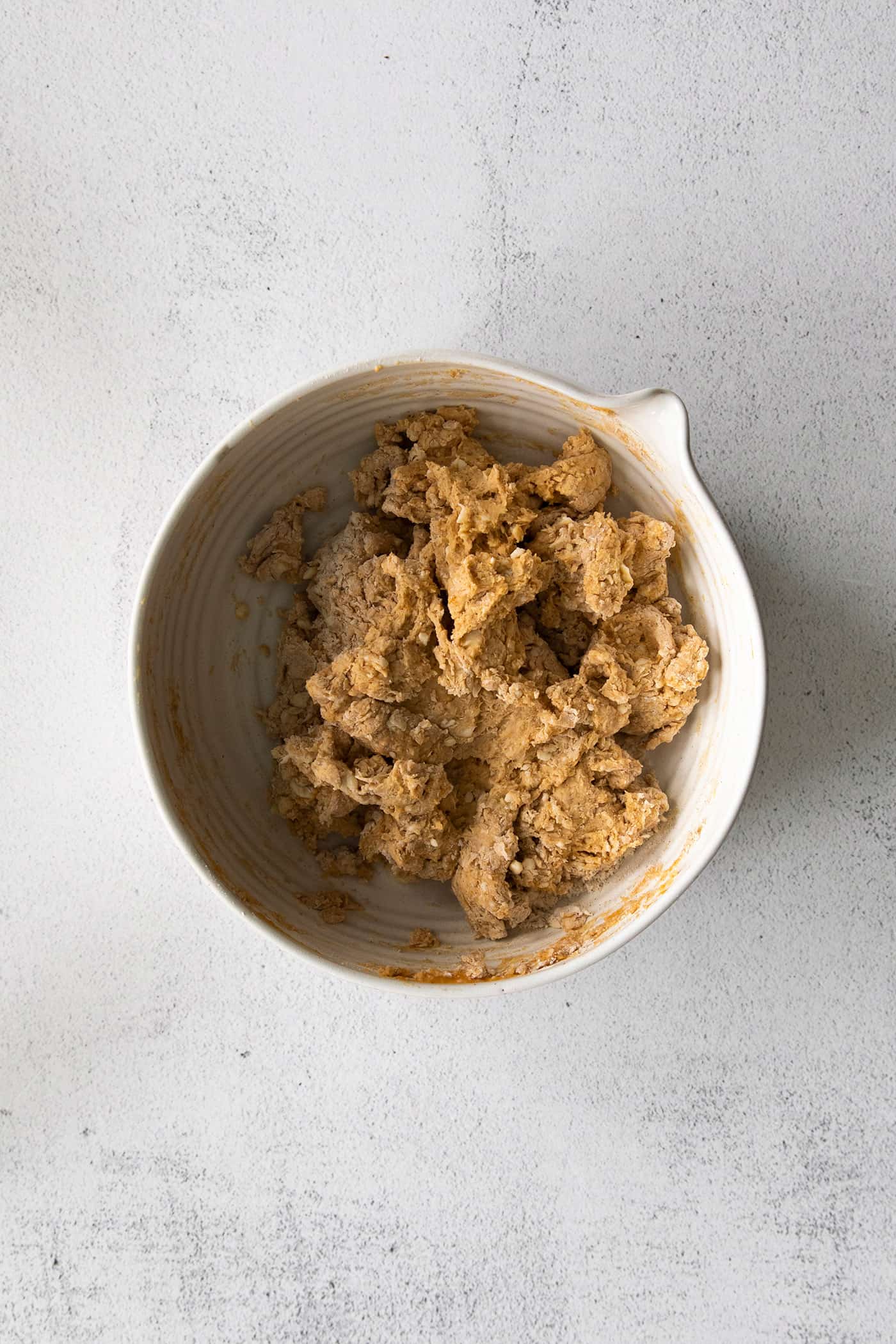 Pumpkin biscuit dough in a bowl