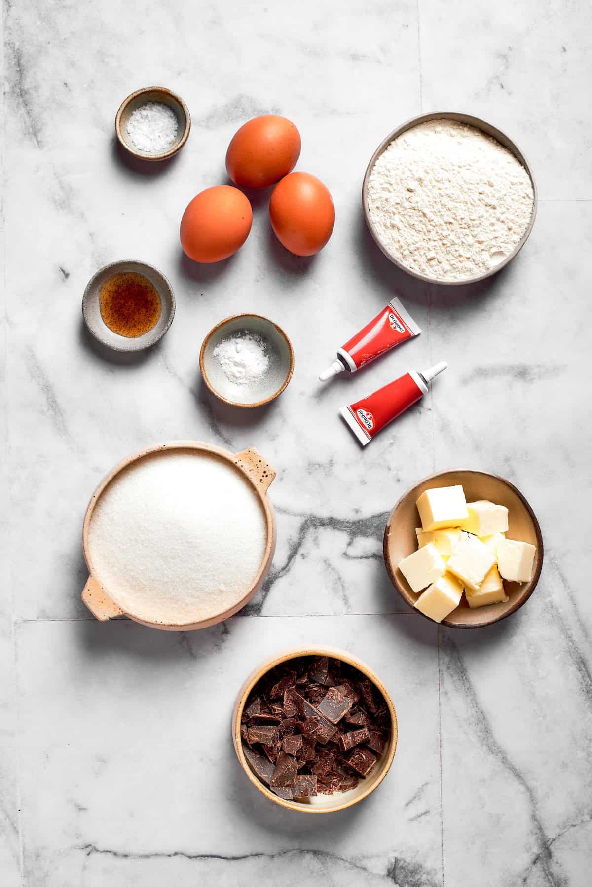 These Red Velvet Brownies are dense and fudgy, exceptionally moist, and fantastically rich. The cream cheese frosting on top is perfection! Overhead view of ingredients for red velvet brownies
