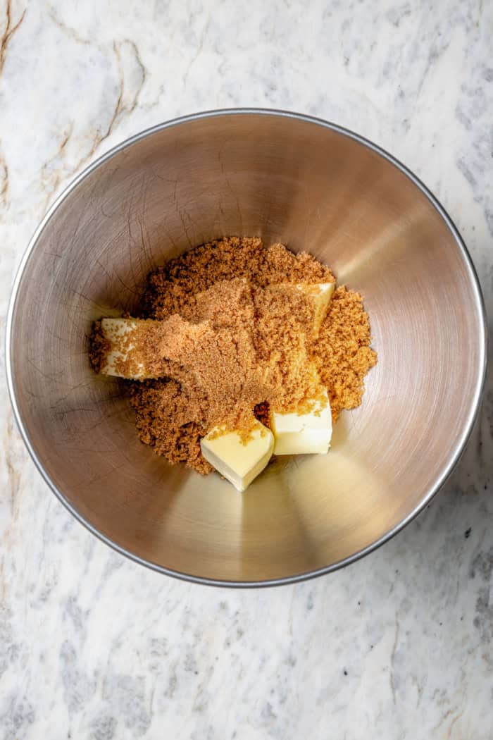Full of warm spices, these simple spice cookies are a great addition to any holiday cookie platter. They're so easy to make too! Brown sugar and butter in mixing bowl