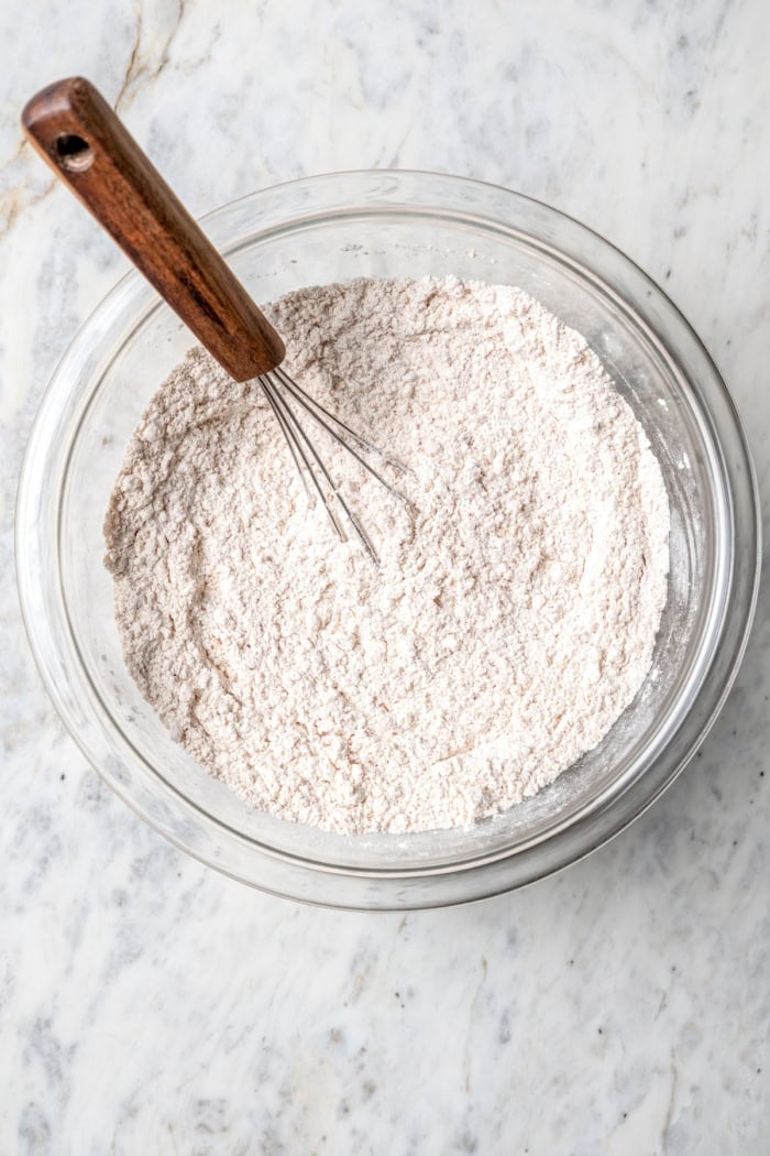 Full of warm spices, these simple spice cookies are a great addition to any holiday cookie platter. They're so easy to make too! Whisking dry ingredients in mixing bowl