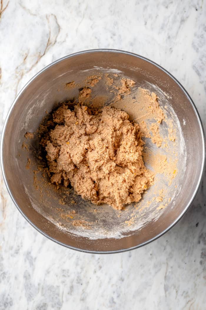 Full of warm spices, these simple spice cookies are a great addition to any holiday cookie platter. They're so easy to make too! Spice cookie dough in mixing bowl