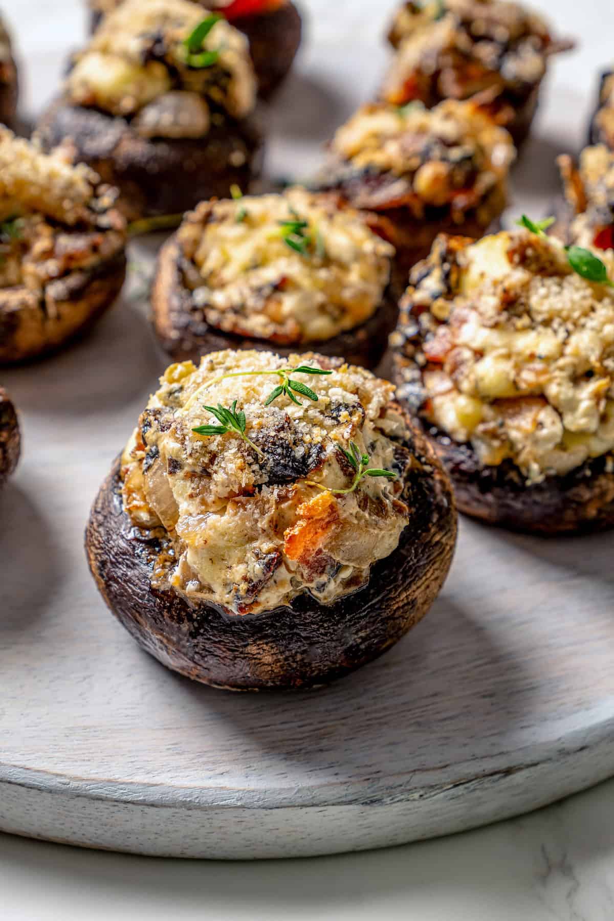 Closeup of stuffed mushrooms with bacon and blue cheese