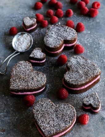 4 large heart shaped brownies with buttercream and 2 small ones.