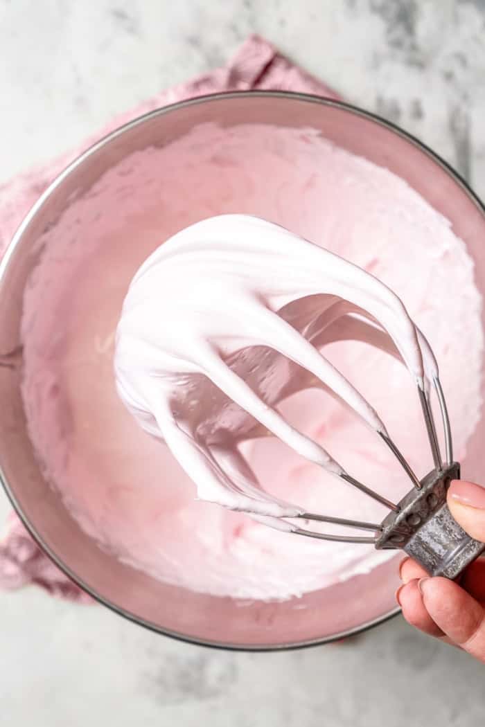 Homemade Marshmallow Hearts are the very best way to send a little love on Valentine’s Day — or any time of year. Fluffy, puffy, and sweet! Marshmallow mixture on whisk attachment, showing thick and fluffy consistency