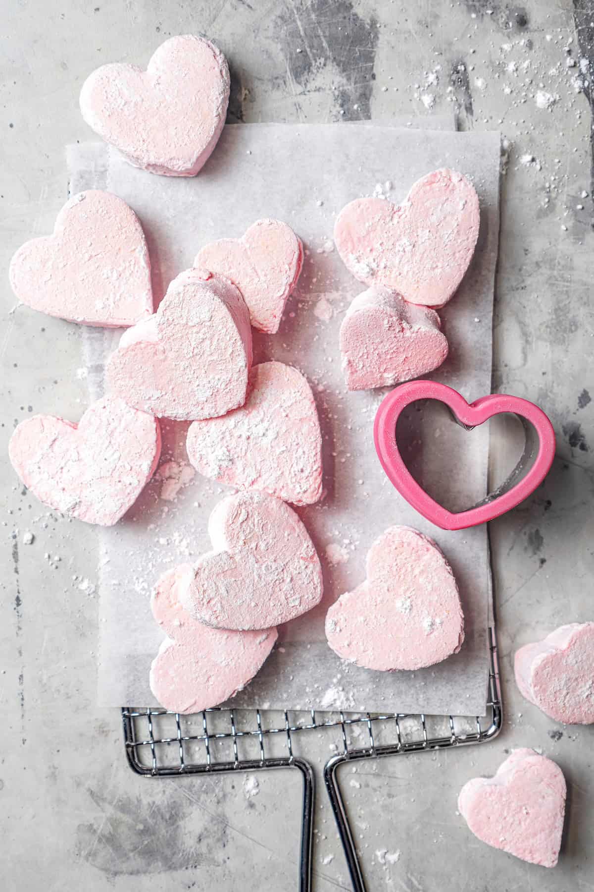 Homemade Marshmallow Hearts are the very best way to send a little love on Valentine’s Day — or any time of year. Fluffy, puffy, and sweet! Homemade marshmallow hearts with heart-shaped cutter