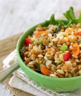 A bowl of three grain and vegetable salad.