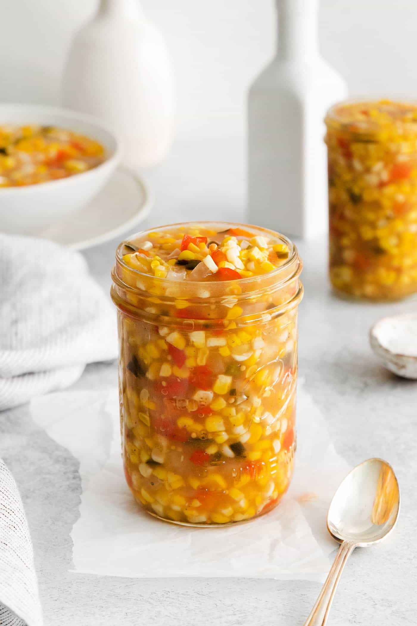 Made with fresh sweet corn, peppers, and onion this Zesty Sweet Corn Relish is just what you need to spice up dishes from tacos to burgers. A jar of sweet corn relish