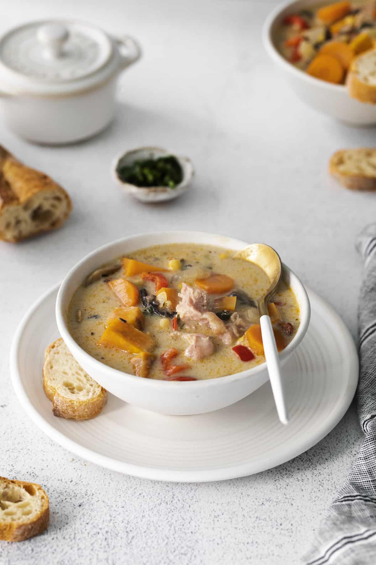 Make this easy Smoked Turkey Chowder recipe in one pot. It's lightly creamy and loaded with flavor, a great way to use up turkey leftovers! A bowl of smoked turkey chowder