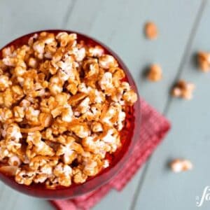 a red bowl of cinnamon caramel corn