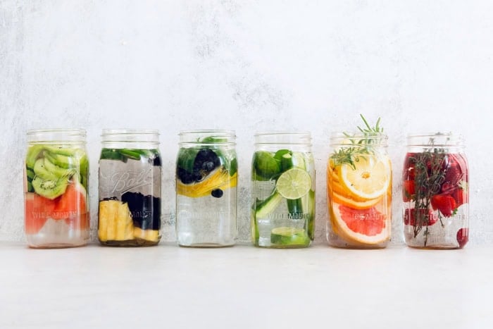 6 varieties of spa water in large jars