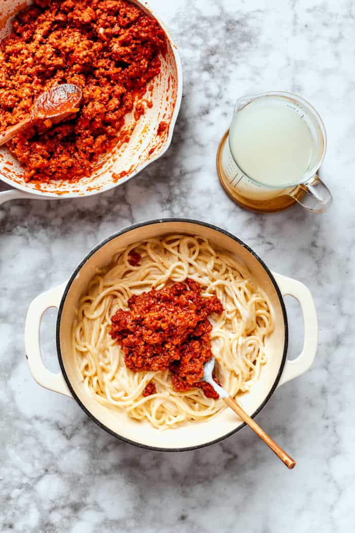Meaty sauce, super fun spaghetti noodles, and pockets of Cheesy Yum make this Spaghetti Casserole an instant hit with the whole family! Adding meat sauce to cooked spaghetti