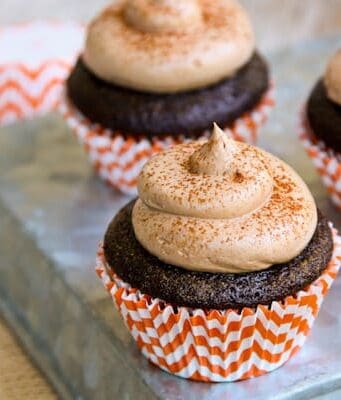 These pumpkin spice cupcakes are filled with pumpkin marshmallow cream and topped with chocolate buttercream.