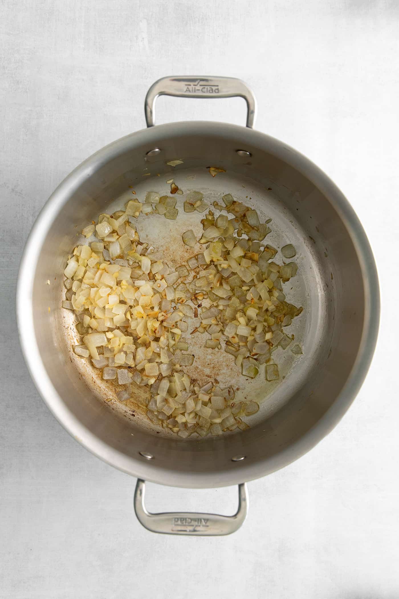 This Creamy Potato Soup with Herby Compound Butter gets everything right. It's silky smooth, rich but not heavy, and lightly buttery. Sauteed garlic and onions in a pot