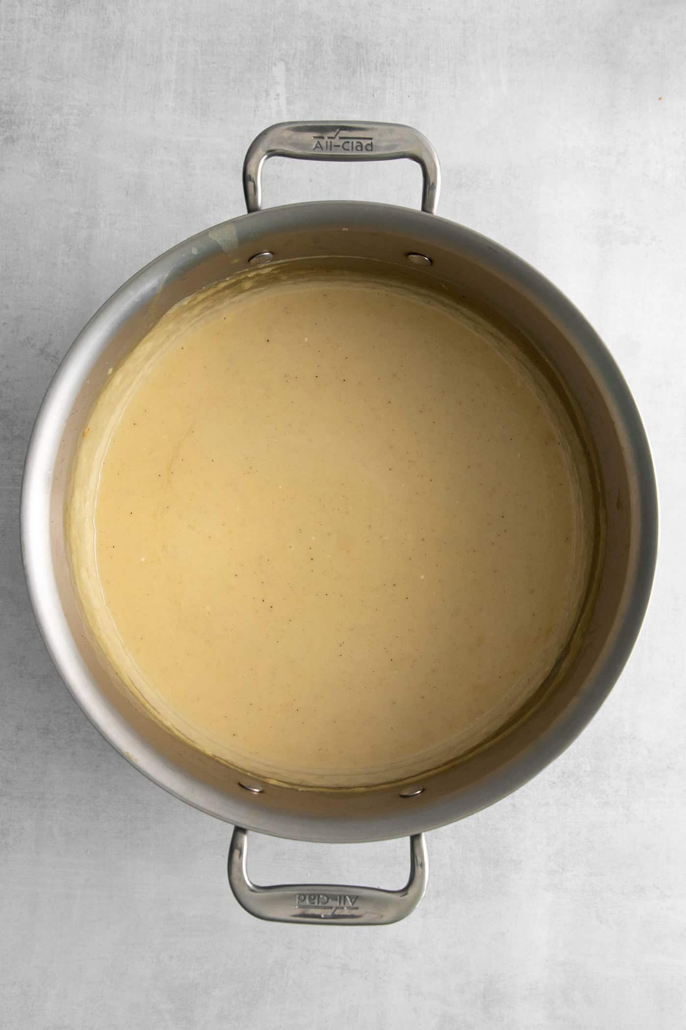 This Creamy Potato Soup with Herby Compound Butter gets everything right. It's silky smooth, rich but not heavy, and lightly buttery. Creamy potato soup in a pot