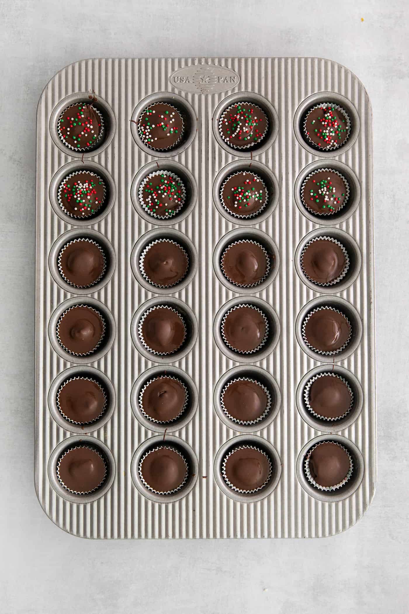 Made with just 5 ingredients, these Homemade Peanut Butter Cups are a million times better than anything you can buy at the store. Peanut butter cups in a mini muffin tin
