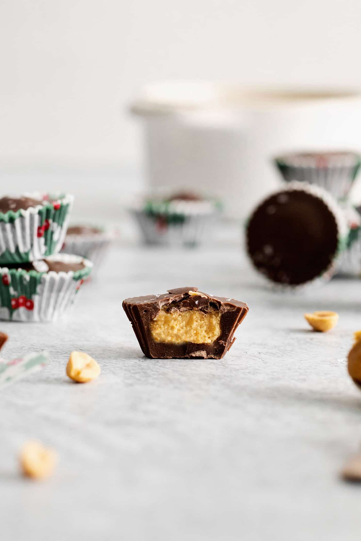 Made with just 5 ingredients, these Homemade Peanut Butter Cups are a million times better than anything you can buy at the store. A peanut butter cup with a bite missing