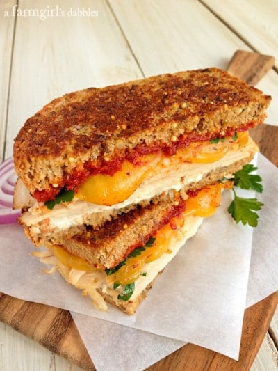 Herby Turkey Grilled Cheese Sandwich cut in half and stacked on top of each other
