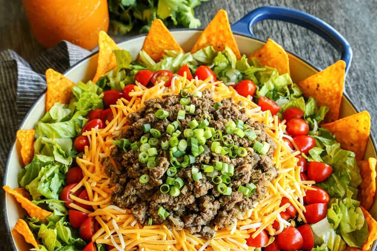 Dorito taco salad in a large blue bowl