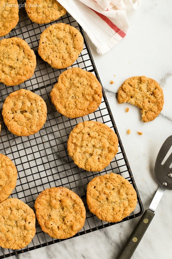 Peanut butter sandwich cookies combine soft, chewy peanut butter cookies with a rich and creamy filling, for double the flavor in every bite! Overhead view of peanut butter cookies on a wire rack.
