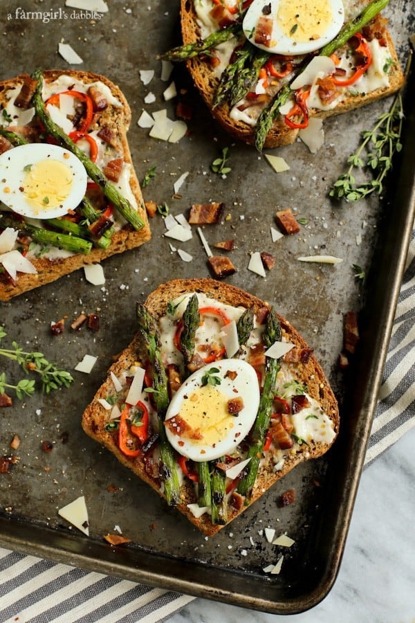 three pieces of Toast with Bacon, asparagus, red pepper, and Egg