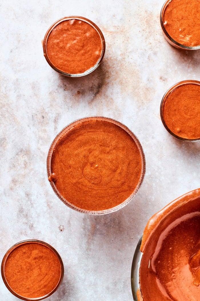 These decadent and delicious Chocolate Mousse Cups are the perfect personal-sized dessert! Serve them at a party and they’ll disappear FAST. Chocolate mousse divided into cups before chilling.