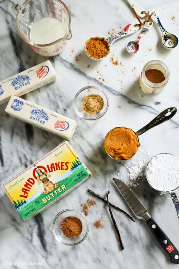 Creamy and luscious, this fluffy whipped pumpkin spiced butter is flavorful and lightly sweetened, bringing fall straight to your table! Overhead view of whipped pumpkin spiced butter ingredients.