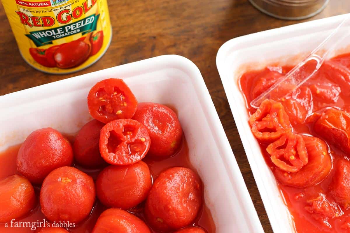 Two trays of canned whole tomatoes side by side, showing the difference in texture between Red Gold tomatoes and another brand.