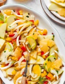 Platter of fennel apple salad with pineapple and ginger dressing.