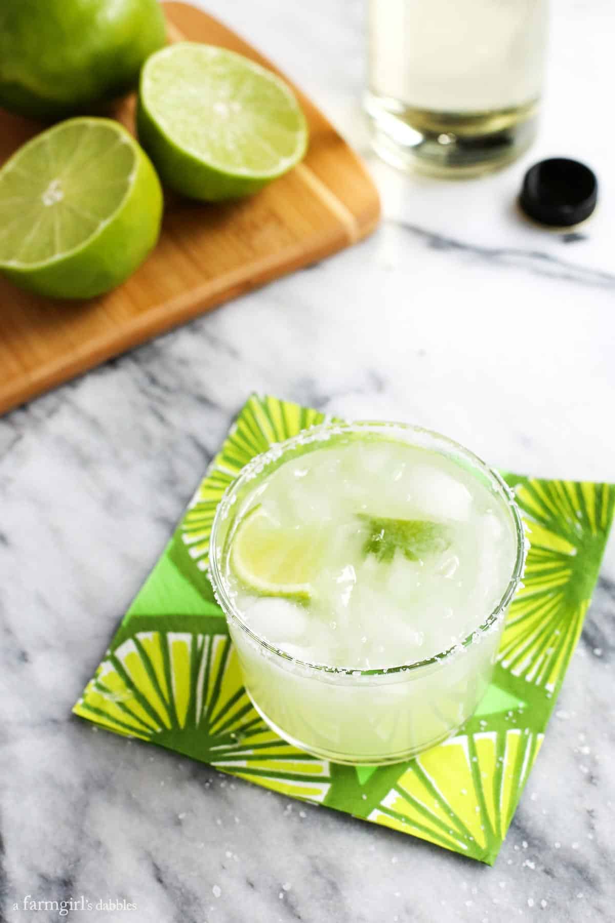 This Classic Margarita Recipe is the only one you'll ever need, whether you want a single drink or a pitcher to share. a salted glass of Margarita