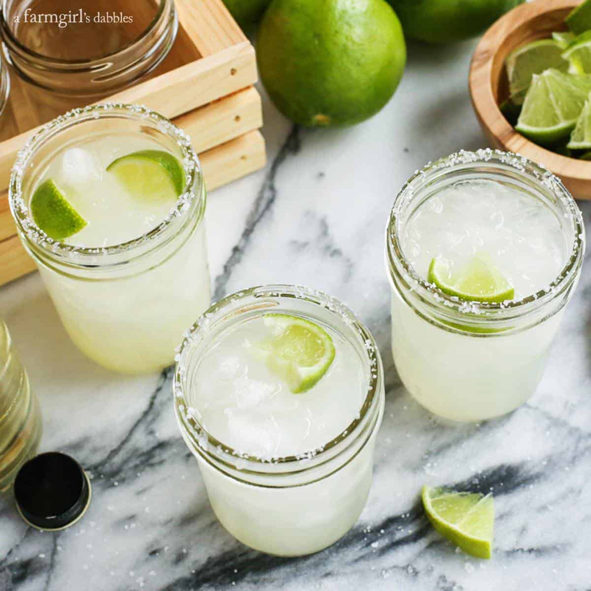 This Classic Margarita Recipe is the only one you'll ever need, whether you want a single drink or a pitcher to share. Margaritas in mason jars