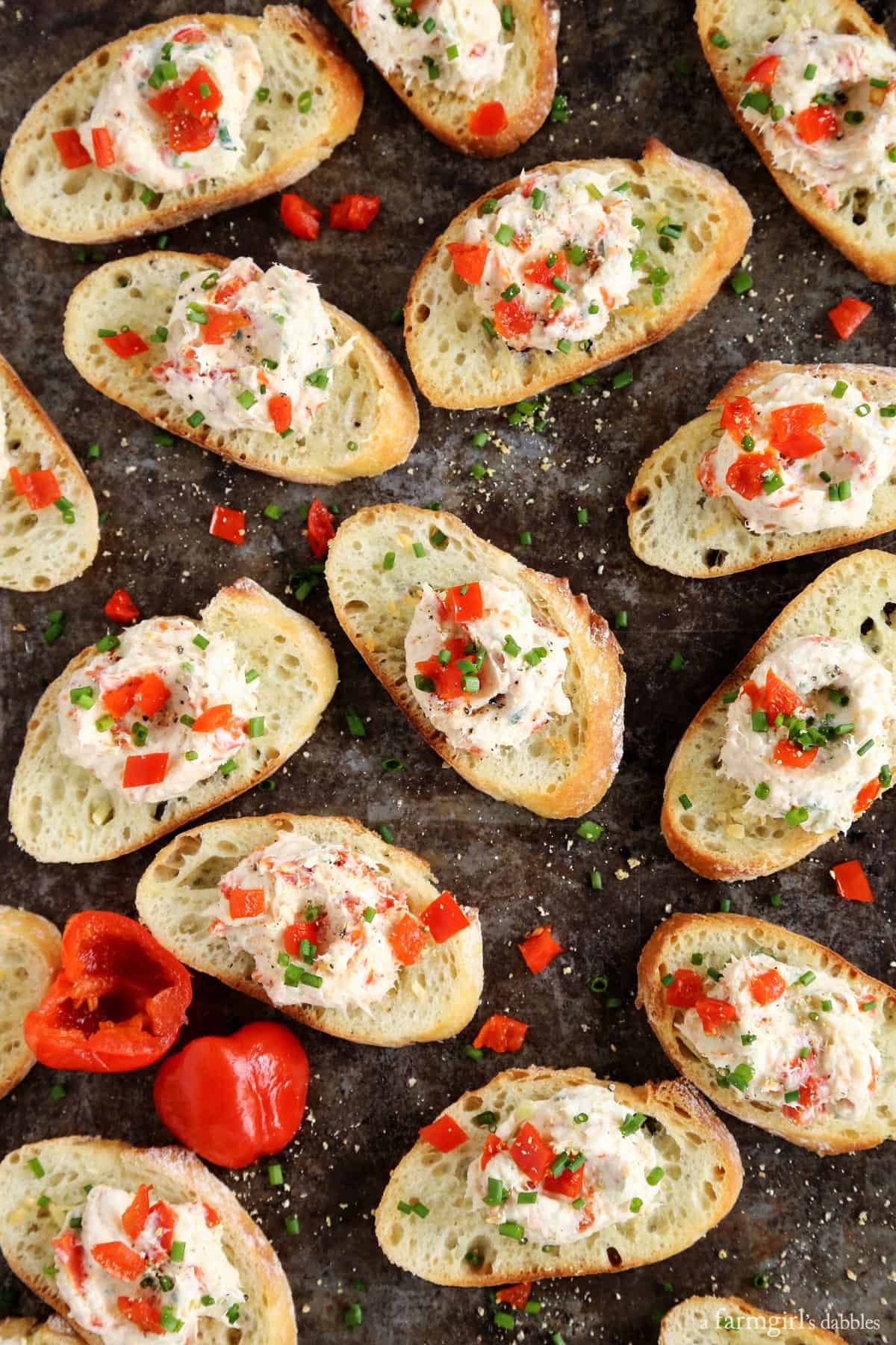 This ultra flavorful Creamy Shrimp and Peppadew Crostini recipe is perfect for any time of year, and especially festive during the holidays. Creamy Shrimp and Peppadew Crostini with fresh green onions