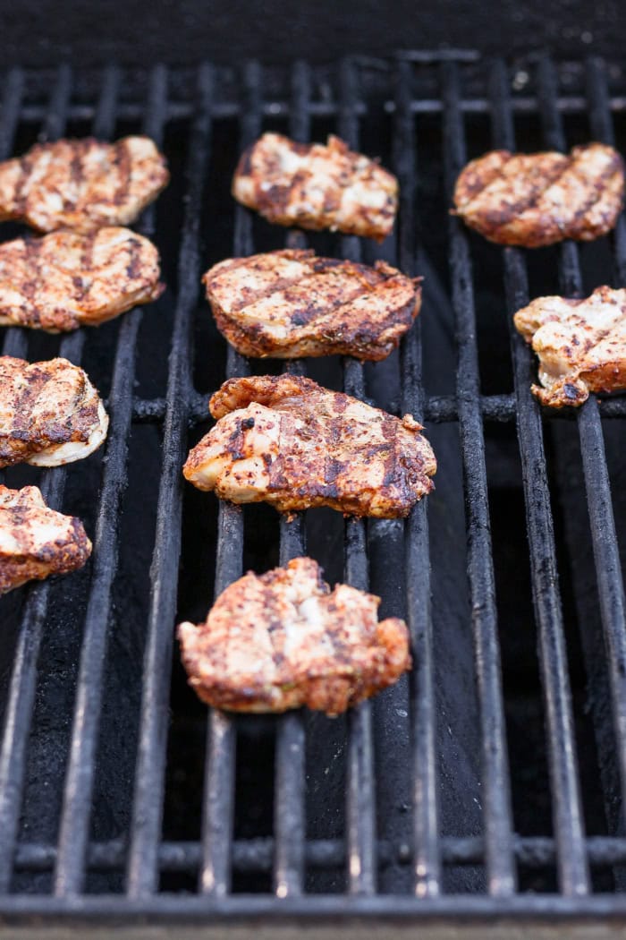 This Grilled Pork and Pineapple Tacos recipe a much easier twist on tacos al pastor. It promises to be your next taco night hit! Sliced pork tenderloin on grill