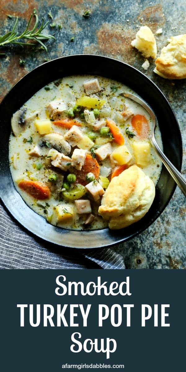 Smoked Turkey Pot Pie Soup is full of rich flavors and creamy comfort, and served with ultra-tender cream biscuits for dipping! pinterest image of Smoked Turkey Pot Pie Soup