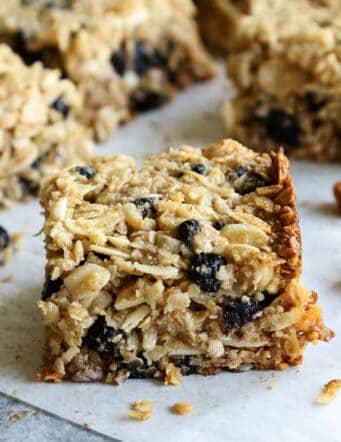 A chewy granola bar with blueberries and almonds