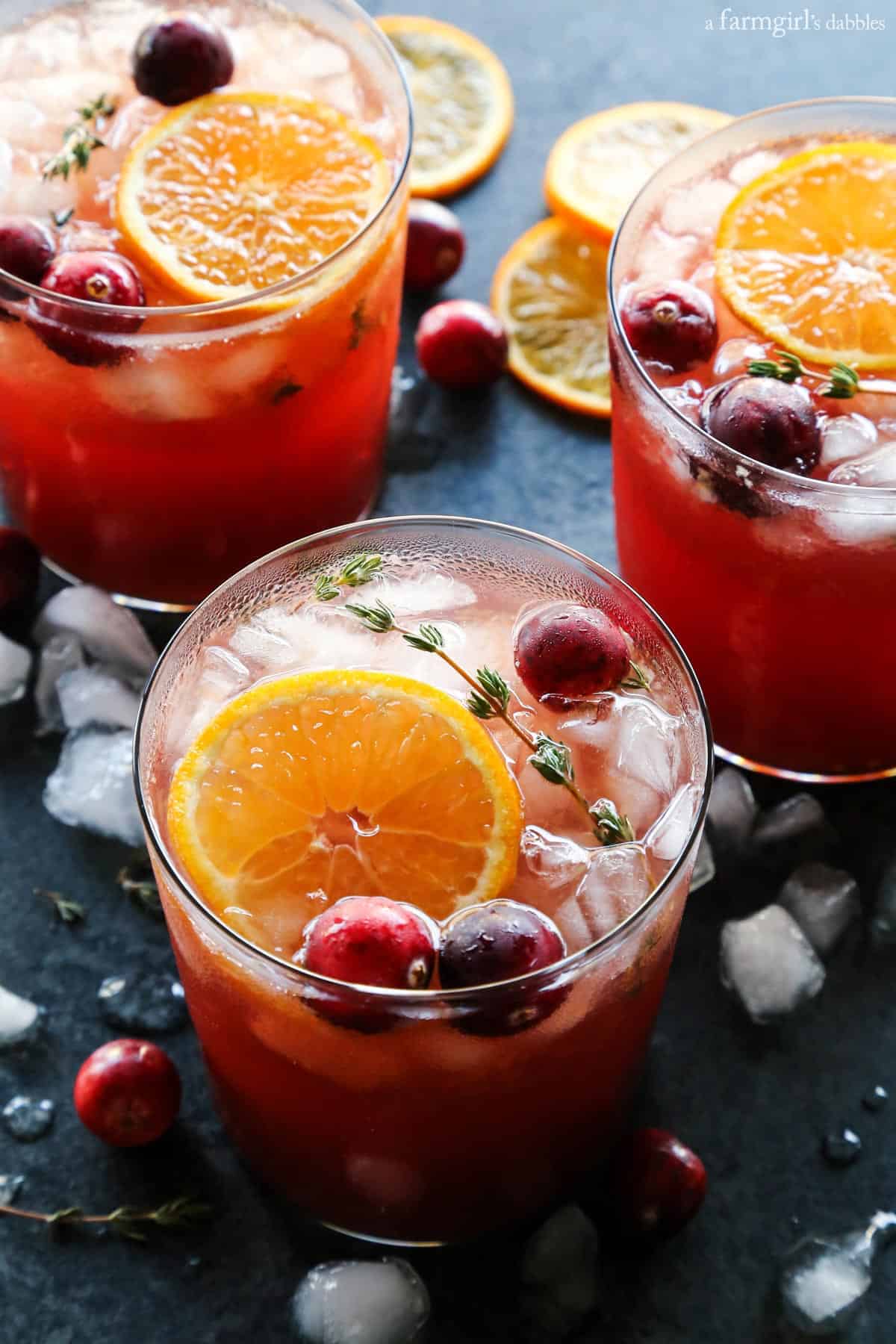 3 glasses of Cranberry Thyme Gin and Tonic