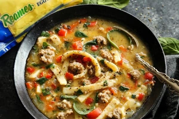 Hearty and satisfying, this Sausage and Red Pepper Soup with Egg Noodles is packed with comfort and delicious flavor! egg noodle soup
