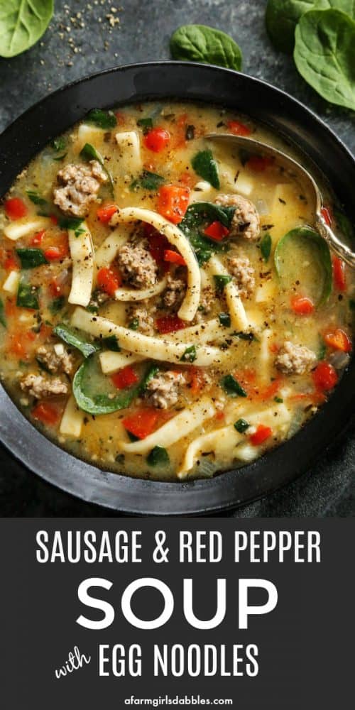 Hearty and satisfying, this Sausage and Red Pepper Soup with Egg Noodles is packed with comfort and delicious flavor! pinterest image of Sausage and Red Pepper Soup with Egg Noodles