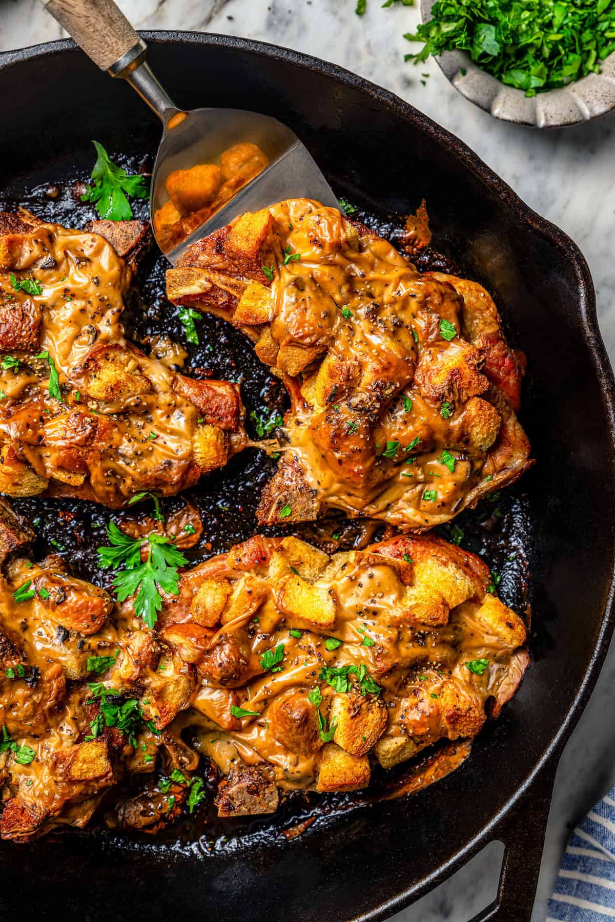 Stove-to-skillet pork chops and stuffing with creamy mushroom sauce on top. 