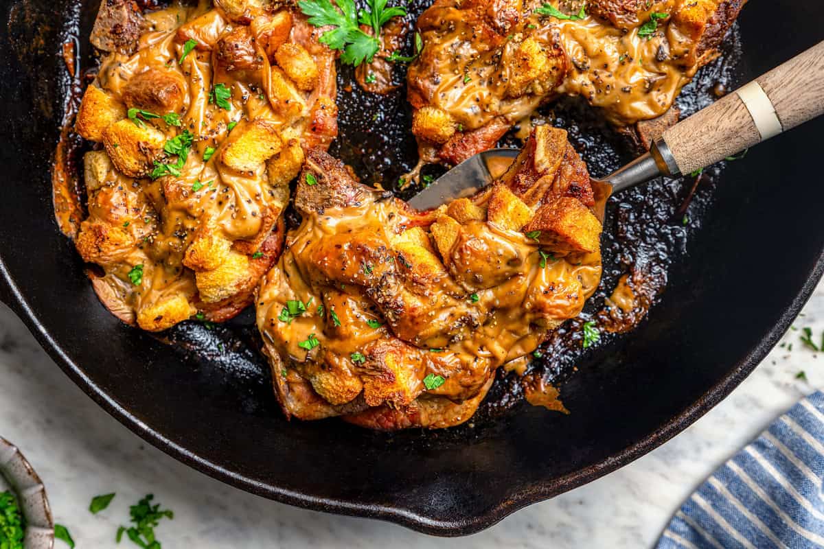 Landscape photo of pork chops and stuffing.