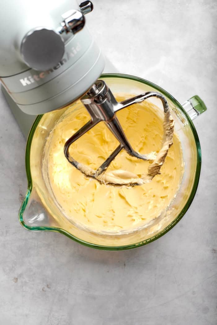 Nutty brown butter, flaky sea salt and fluffy buttercream make this chewy chocolate chip skillet cookie worthy of a celebration. So easy too! Butter in bowl of stand mixer fitted with paddle attachment.